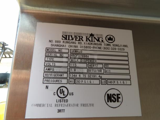 Silver King commercial milk dispenser label, model SKMAJ3, 115 volts, 1.9 amps, refrigerant R134A, NSF and UL listed.