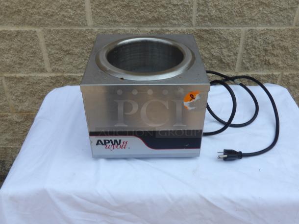 APW Wyott countertop soup warmer, stainless steel, plug-in, used condition, visible wear, partially removed sticker.