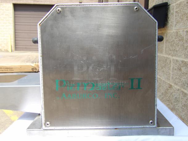 PieMaster II by AAburco, Inc., metal construction, industrial pie maker, visible wear, manufacturer's logo on front panel.