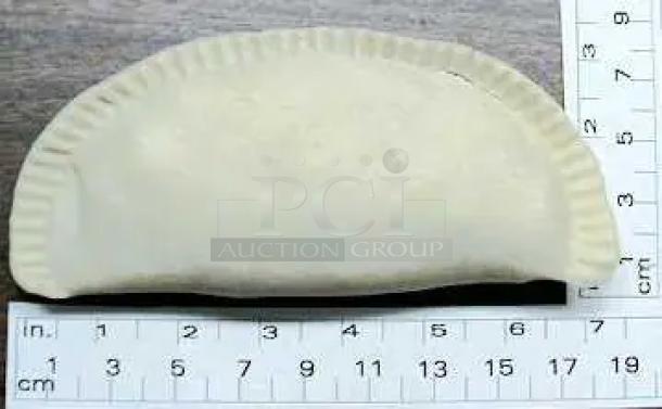 Handmade ceramic empanada sculpture, 16 cm long, beige, with a crimped edge design, on a measuring mat.