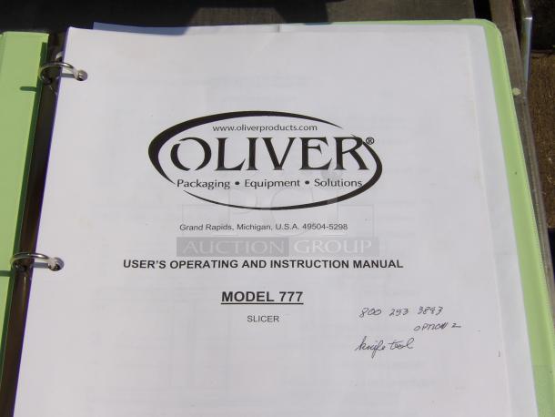Instruction manual for Oliver Model 777 Slicer, featuring contact info and handwritten notes. Binder in good condition.