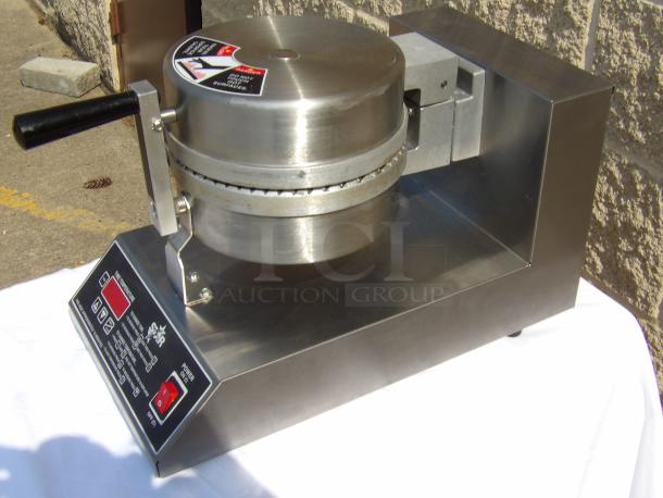 Star Mfg. waffle maker, stainless steel, model SWB7R1, excellent condition, temperature control, power switch visible.