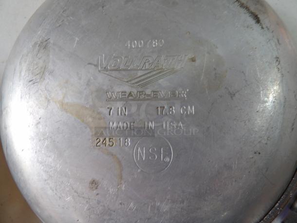 Vollrath Wear-Ever 7-inch pan, model 400780, made in USA. Features wear marks, used condition. Marked 24518, NSF certified.