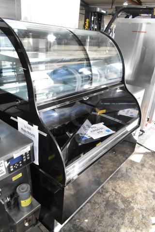 BRAND NEW SCRATCH AND DENT! Avantco 193CAC48B Metal Commercial  47 3/16" Black Curved Dual Service Refrigerated Air Curtain Merchandiser on Commercial Casters. 115 Volts, 1 Phase.
