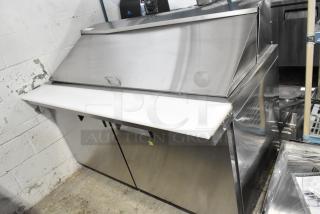 BRAND NEW SCRATCH AND DENT! 2024 Avantco 178APT60MHC 60" 2 Door Mega Top Refrigerated Sandwich Prep Table on Commercial Casters. 115 Volts, 1 Phase.