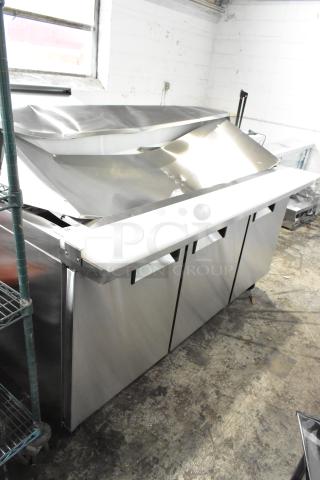 BRAND NEW SCRATCH AND DENT! 2024 Avantco 178APT71MHC 70" 3 Door Mega Top Refrigerated Sandwich Prep Table on Commercial Casters. 115 Volts, 1 Phase.
