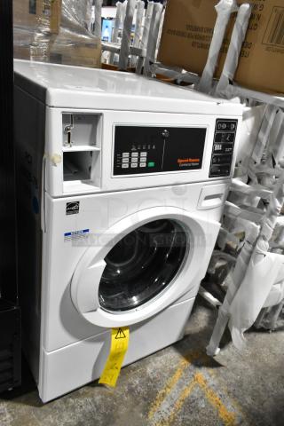 BRAND NEW SCRATCH AND DENT! 2025 Alliance SFNNCASP116TW01 Speed Queen Quantum Gold Pro FV6010WN 3.42 cu. ft. 27" Front Load Commercial Washer with Front Control - Coin Operated.