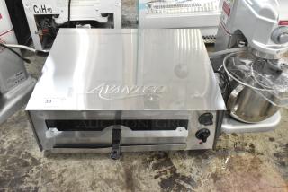 BRAND NEW SCRATCH AND DENT! Avantco 177CPO16TSGL Stainless Steel Countertop Pizza / Snack Oven with Adjustable Thermostatic Control and Glass Door. 120 Volts, 1 Phase. - Item #1189781