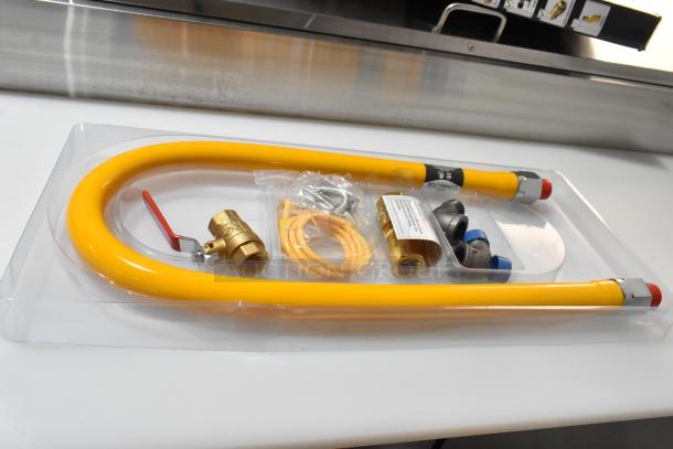 3 BRAND NEW SCRATCH AND DENT! Regency 600GKS3448 48" Stationary Gas Connector Hose Kit with 2 Elbows and Full Port Valve - 3/4". 3 Times Your Bid! - Image 1 of 7