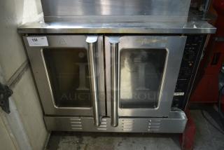 Black Diamond COF-54/NG Stainless Steel Commercial Natural Gas Powered Full Size Convection Oven w/ View Through Doors, Metal Oven Racks and Thermostatic Controls on Commercial Casters. 54,000 BTU.
