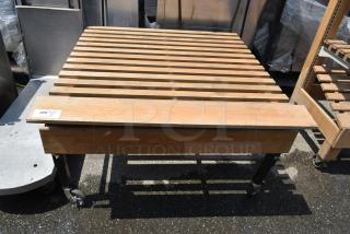 Wooden Produce Stand on Commercial Casters.