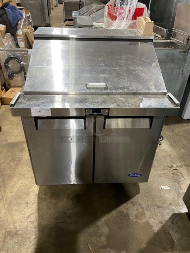 Arctic stainless steel commercial refrigerator, two-door, with top compartment, includes temperature control panel, used condition.