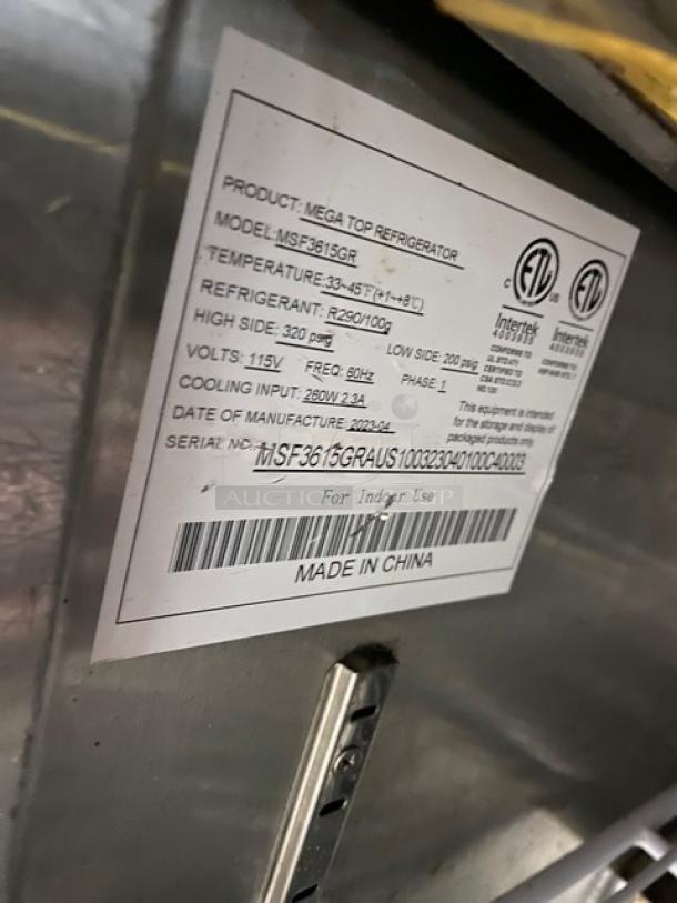 Label on Mega Top Refrigerator, model MSF3615GR. Temp: 33-45°F, refrigerant R290. Made in 2022, 115V, 60Hz, made in China.