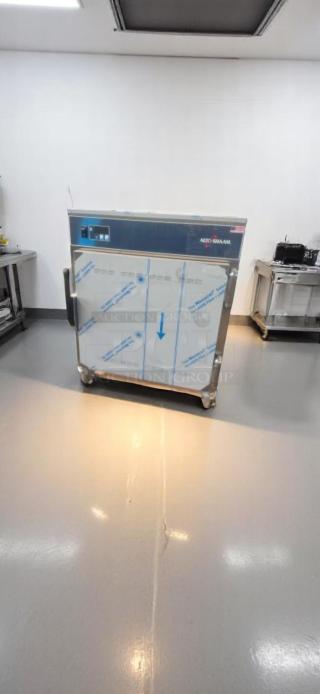 Alto-Shaam food warming cabinet, stainless steel, with control panel and protective film. Excellent condition.