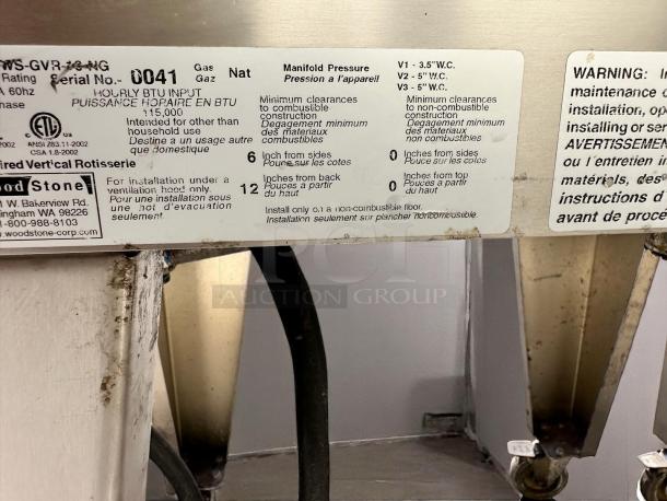 Label on a commercial gas rotisserie, serial number 0041, 115,000 BTU, non-household use, with installation instructions.