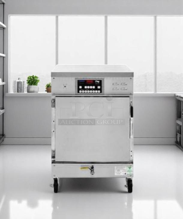 Commercial oven on wheels, stainless steel, digital controls, large front door, excellent condition, ideal for professional use.