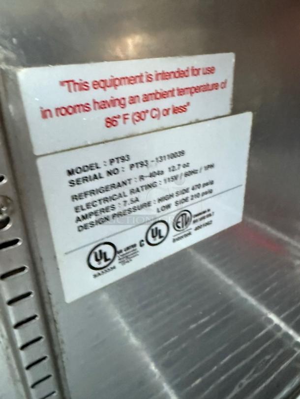 Metal equipment label showing model PT93, serial number, electrical rating 115V, refrigerant R-404a, UL certified.