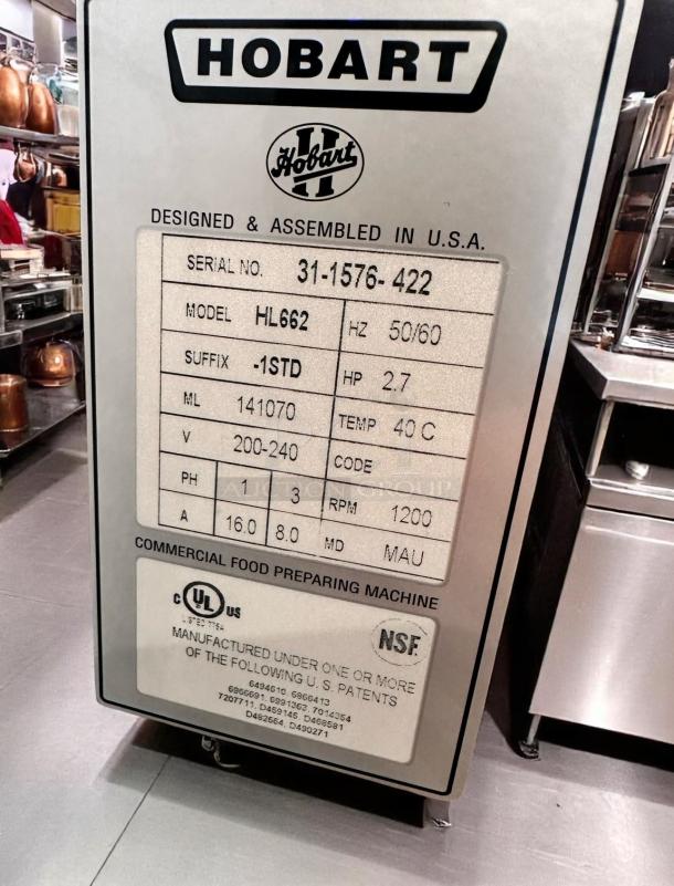 Hobart commercial food prep machine, model HL662. Designed in USA, 2.7 HP, 50/60 HZ, NSF certified. Serial 31-1576-422.