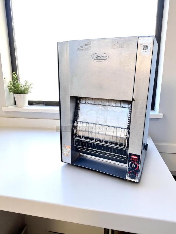 Hatco commercial countertop toaster, stainless steel, visible controls and labels, in good condition.