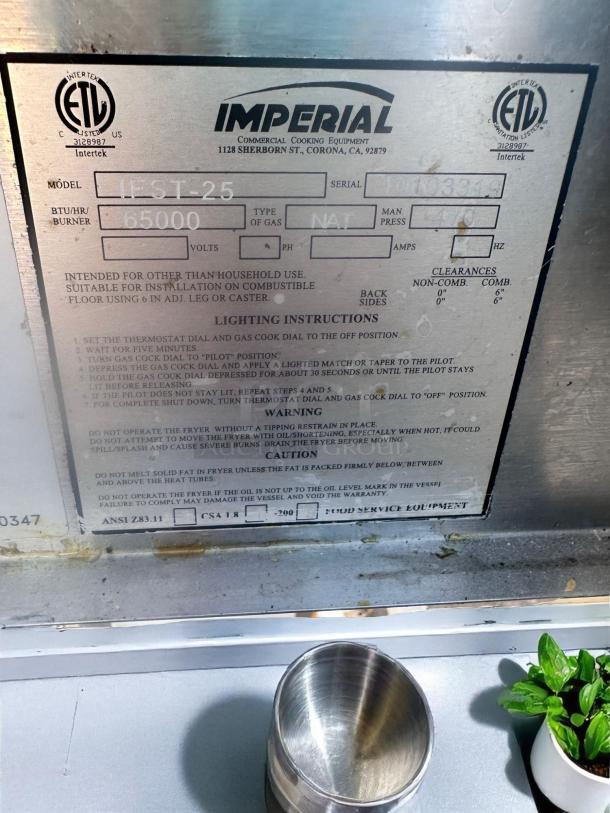 Imperial II-ST-25 commercial cooking equipment label with specs: 65,000 BTU, natural gas, lighting instructions, ETL listed.