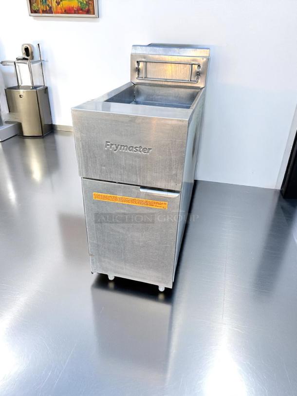 Frymaster commercial fryer in stainless steel, excellent condition, with visible branding and safety instructions label.
