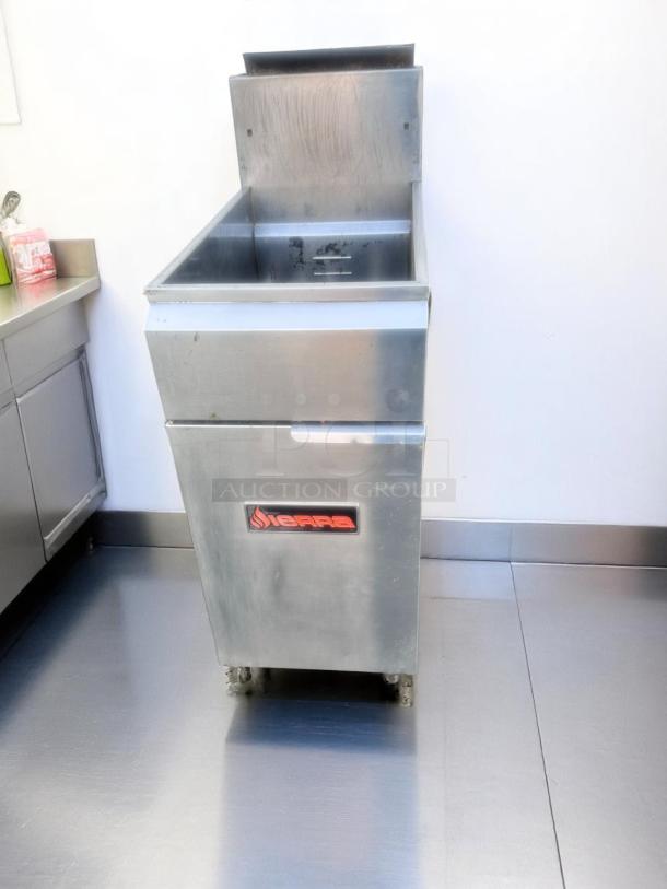 Commercial stainless steel Sierra deep fryer, used condition, with visible logo on the front. Suitable for restaurant use.