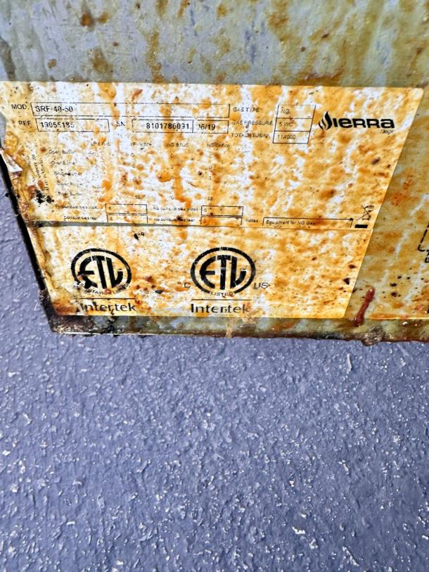 Weathered machinery label, reads "Sierra" and "Intertek ETL," model SRF-48-30, showing certifications and specifications.