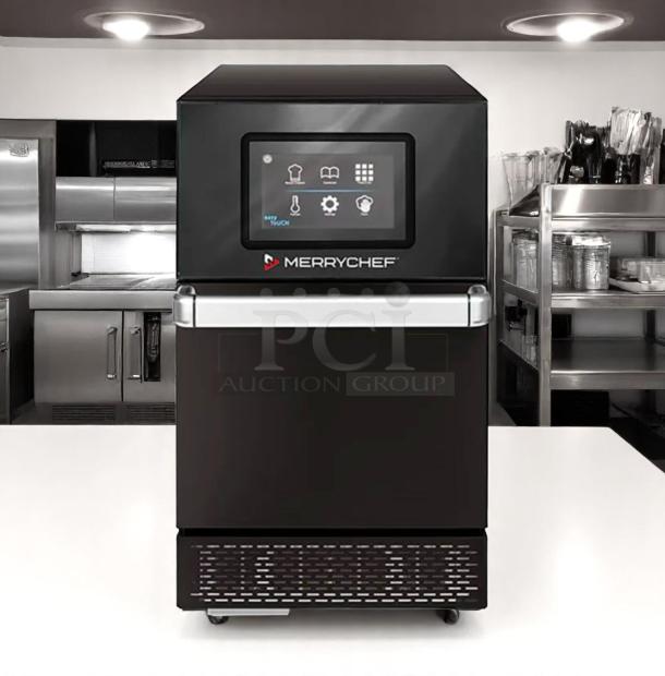 Merrychef commercial oven with touchscreen controls, black stainless steel, modern, excellent condition. Perfect for quick service restaurants.