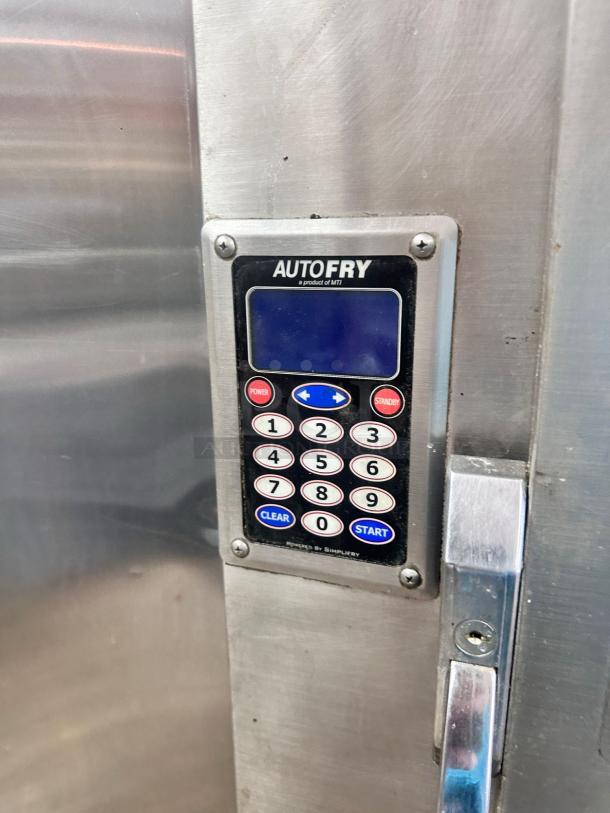 AutoFry digital control panel with keypad, stainless steel surface, in good condition, featuring power and start buttons.