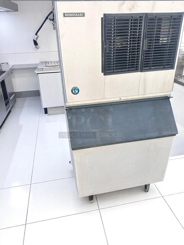 Hoshizaki commercial ice maker, stainless steel, air-cooled, good condition, with manufacturer label and ventilation grills.