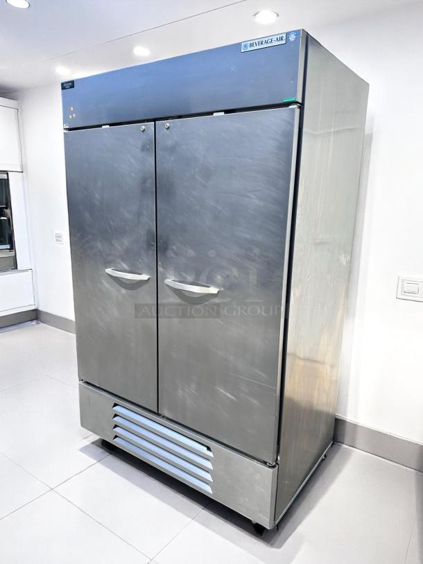 Beverage-Air stainless steel commercial refrigerator, two doors, good condition, model badge visible, suitable for restaurant use.