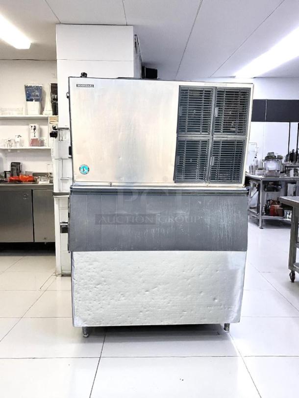 Hoshizaki commercial ice maker, large capacity, stainless steel, used condition with visible wear. Suitable for high-demand settings.