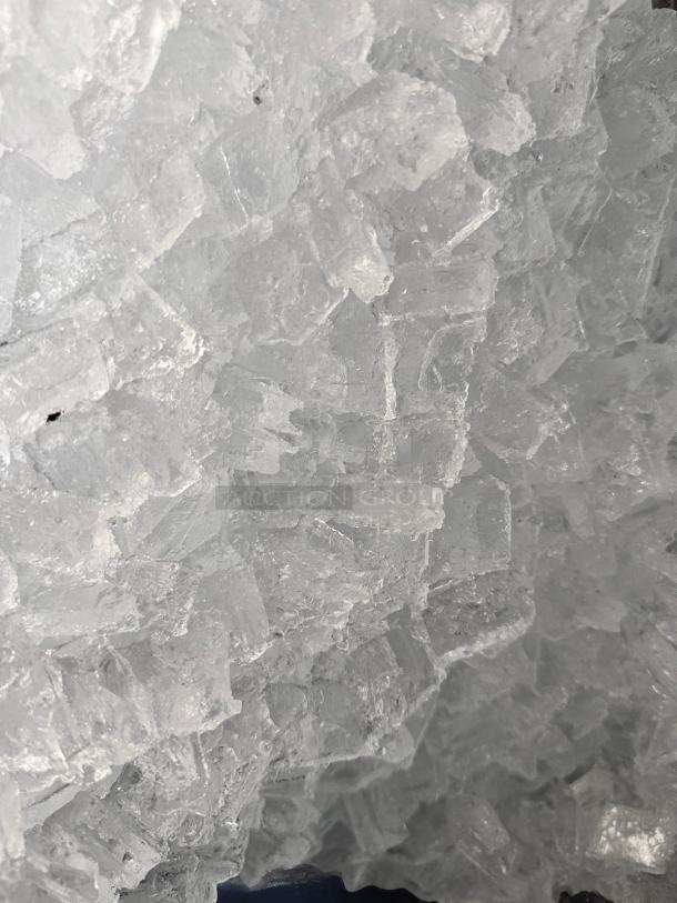 Close-up of a translucent mineral crystal cluster with distinct geometric shapes, in excellent condition.