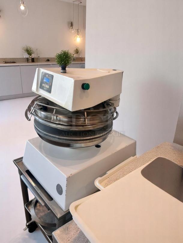 Commercial dough mixer with control panel, stainless steel bowl, in excellent condition, ideal for bakery use.