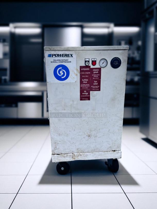 Powerex oilless rotary scroll compressor on wheels. Features gauge, control panel, visible wear. Ideal for industrial use.