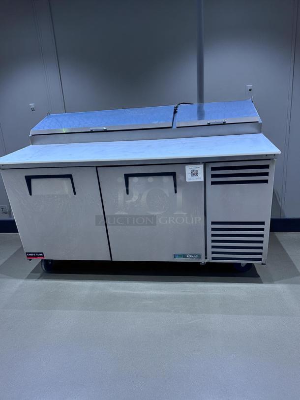 Stainless steel refrigerated prep table, True brand, dual-door, perfect condition, Chef's Toys label, visible QR code.