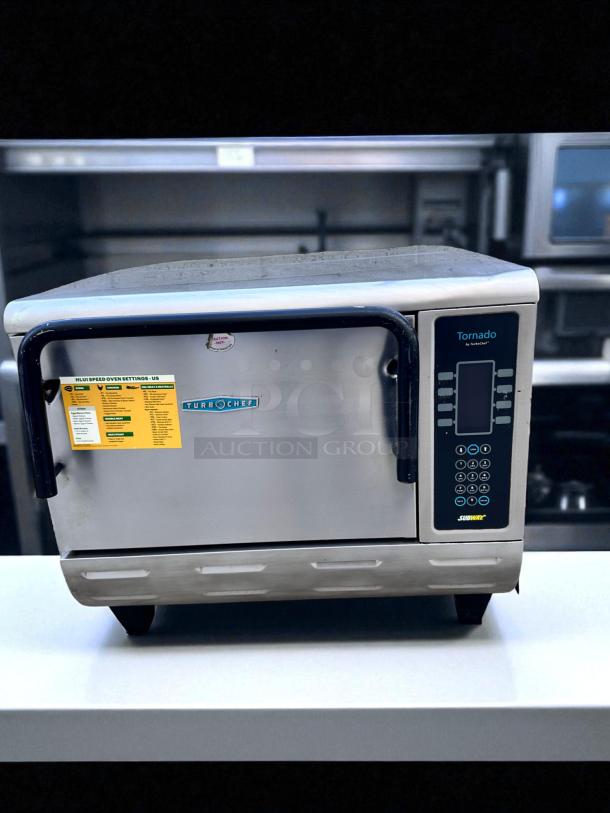 TurboChef Tornado high-speed oven, stainless steel, features digital controls and labelled settings, in used condition.