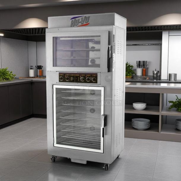 Nu-Vu commercial oven, stainless steel, dual doors, top oven, bottom proofer, control panel, caster wheels, excellent condition.
