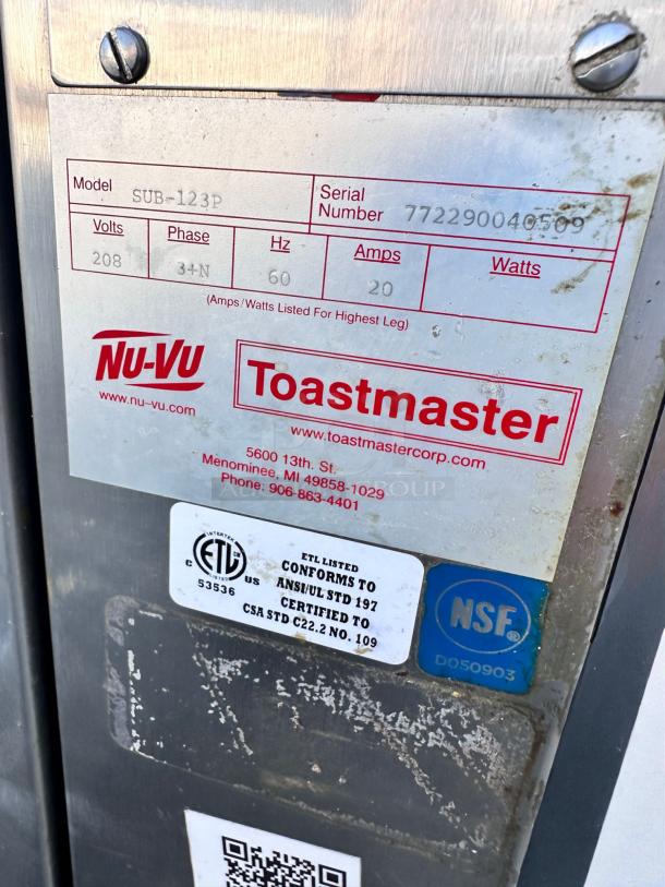 Nu-Vu Toastmaster oven label showing model SUB-123P, serial number 772290040590. ETL and NSF certified.