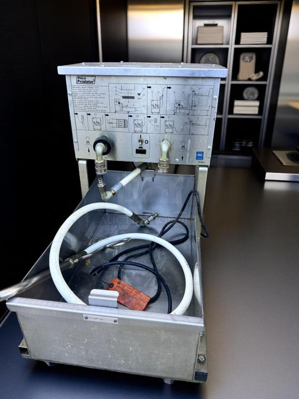 Pitco Frialator commercial fryer with control panel diagram. Includes hoses and wiring. Used condition with surface wear.