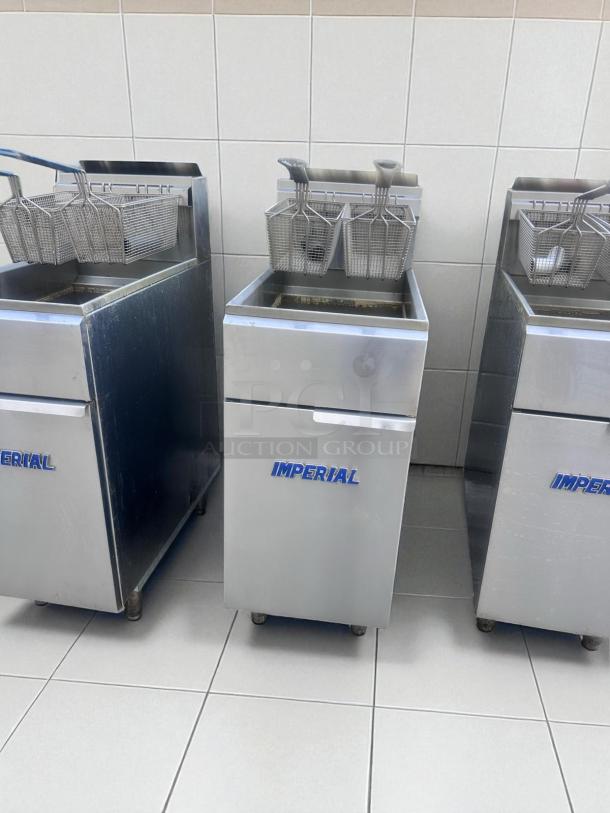 Imperial commercial deep fryer with dual baskets, stainless steel, good condition, visible brand logo on unit front.