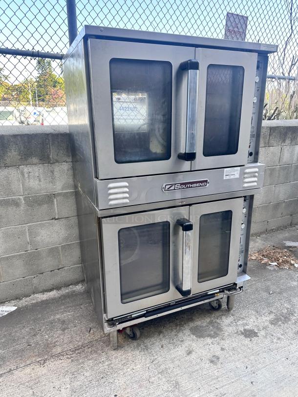 Southbend double-deck convection oven on wheels. Stainless steel, used condition, clear glass doors, visible labels, model 4422403.