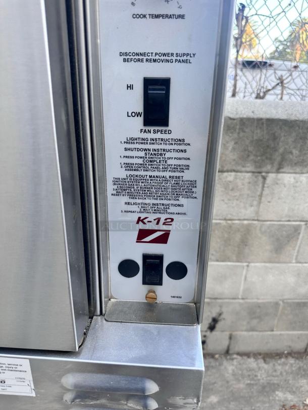 Commercial oven control panel with labeled switch for fan speed and instructions for operation. Model K-12 printed.
