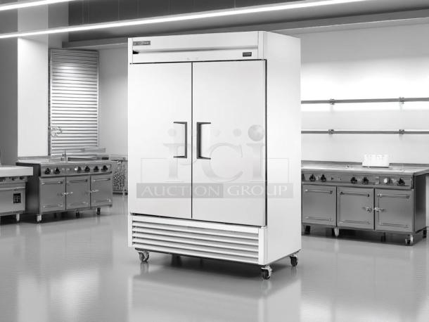 Commercial double-door stainless steel refrigerator on wheels, new condition, model tag visible at top.