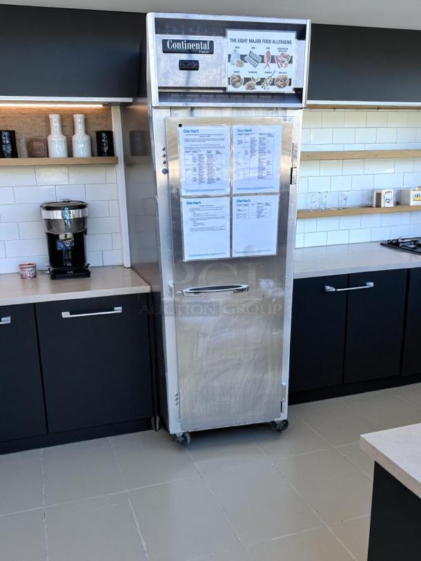 Continental Freezer in stainless steel with allergy chart and Startech documents attached, used condition.