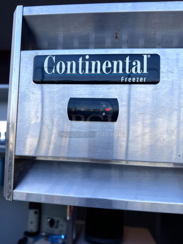 Continental stainless steel freezer with digital control panel; shows signs of wear, suitable for commercial use.
