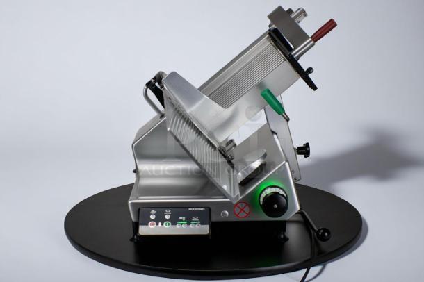 Bizerba meat slicer, stainless steel, integrated controls, precision dials, excellent condition, ideal for commercial use.
