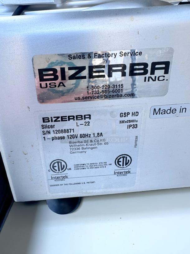 Bizerba slicer model L-22 with serial number 12088871, 120V 60Hz, made in Germany. Features ETL and Intertek certifications.