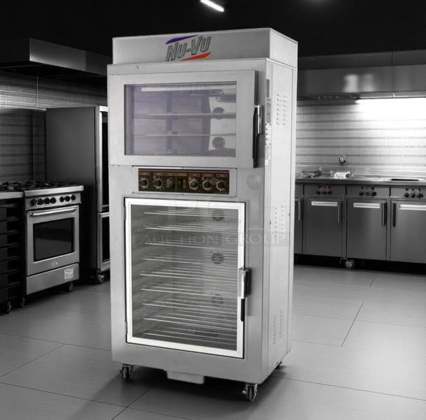 Nu-Vu commercial oven with control panel, glass doors, multiple racks, on casters; ideal for bakery or restaurant use.