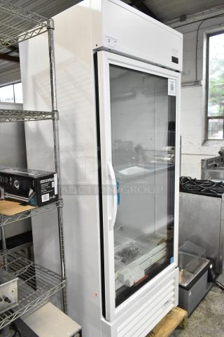 BRAND NEW SCRATCH AND DENT! 2024 True TSCI-600R-G-PH Metal Commercial Single Door Reach In Cooler Merchandiser w/ Poly Coated Racks. 115 Volts, 1 Phase.